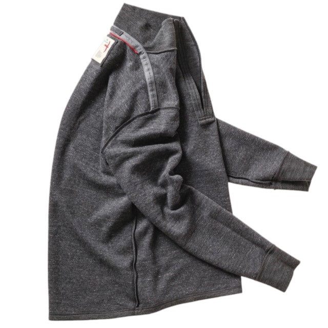 The RELWEN Wool and Cotton Quarter Zip in Charcoal Heather is laid flat on a white background, featuring long sleeves slightly bent at the sides and a collar partially unzipped.