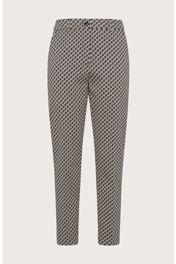 The SEVENTY Slim Fit Ankle Length Stretch Jacquard Pant by SEVENTY showcases a sleek black, white, and beige houndstooth pattern. These mid-rise trousers feature a button and zipper closure, pleats at the waist, and are expertly crafted from a bi-stretch technical poly blend for superior comfort and flexibility.