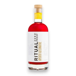 A bottle of RITUAL ZERO PROOF - APERITIF ALTERNATIVE by RITUAL ZERO PROOF—an ideal choice for creating a non-alcoholic spritz—is shown upright on a white background, featuring vibrant red liquid, a crisp white label, and a yellow neck tag. Inspired by classic Italian aperitivos, this sophisticated alternative delivers bold flavor without the alcohol.