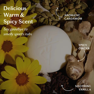 A person in a white robe rubs the KATE MCLEOD RECOVERY STONE | SOOTHING MUSCLE BALM on their thigh, with text highlighting its benefits: soothes sore muscles, reduces stress, is mess-free, and deeply nourishes dry skin.