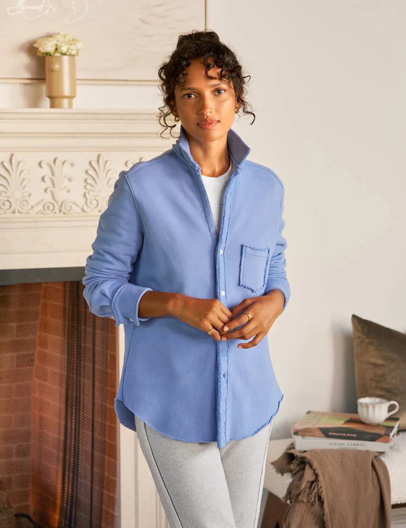 The FRANK &amp; EILEEN Eileen Relaxed Button Up Shirt in Triple Fleece Frost is a light blue, long-sleeve, relaxed fit shirt with a single chest pocket and rolled cuffs, shown on a white background. Garment-dyed for a casual look.