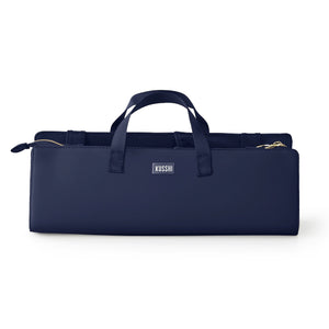 The KUSSHI - Hair Tools Travel Bag in Navy is a rectangular, heat-resistant case with zipper closure, small carrying handles, and the KUSSHI label on the front.