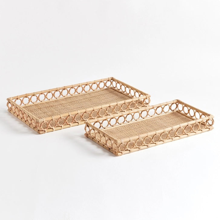 The NAPA HOME AND GARDEN Ninette Rectangular Rattan Tray, Large, features raised sides and a decorative open circle edge in natural beige—ideal for bringing boho coastal charm to your home decor.