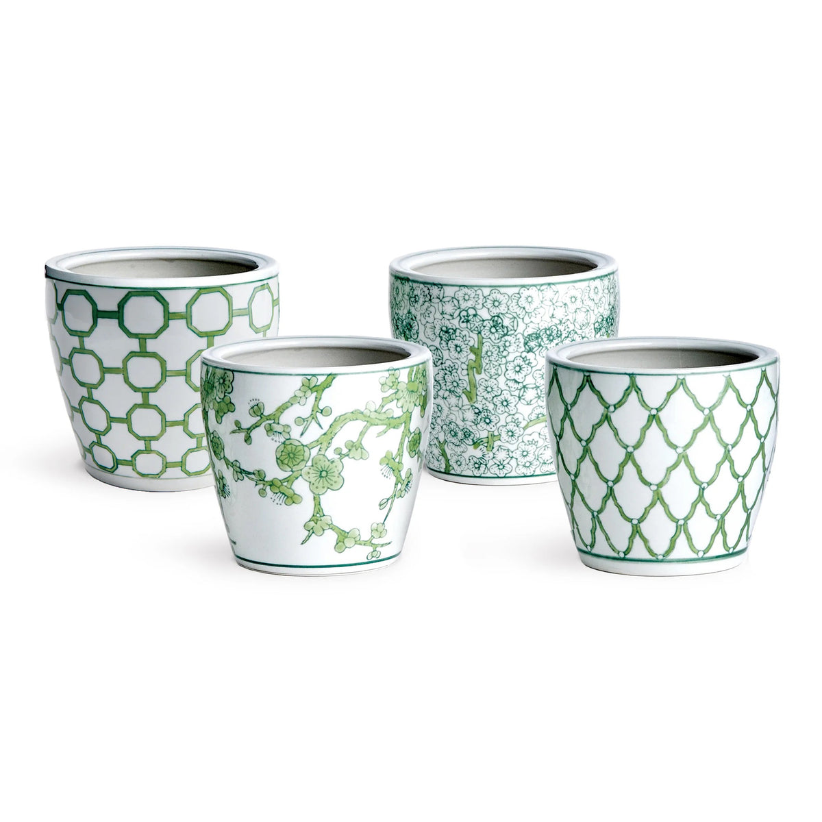 The NAPA HOME AND GARDEN - IMPERIAL MIDI POT is an exquisite decorative ceramic planter featuring intricate green patterns on a white background. It showcases distinct designs, from geometric shapes to floral motifs reminiscent of chinoiserie style, and includes convenient drain holes for optimal plant care.