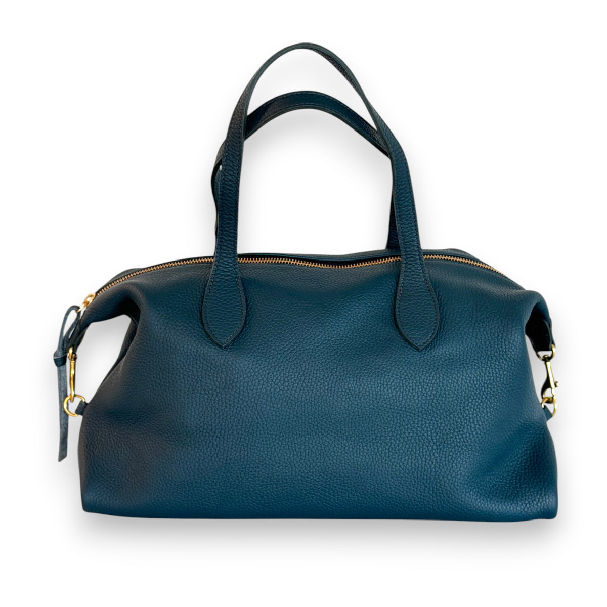 The OLIVEVE Sutton Convertible Satchel, in black Mediterranean buffalo cowhide leather, features two handles and gold hardware on a white background. It boasts a textured surface and has a secure zip closure.