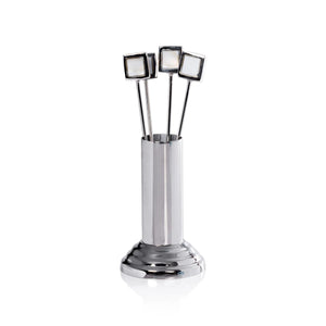 The ZODAX SPIGA COCKTAIL PICKS WITH STAND includes 4 brass alloy picks with square handles in a shiny silver 2x2x5-inch holder, set against a white background.
