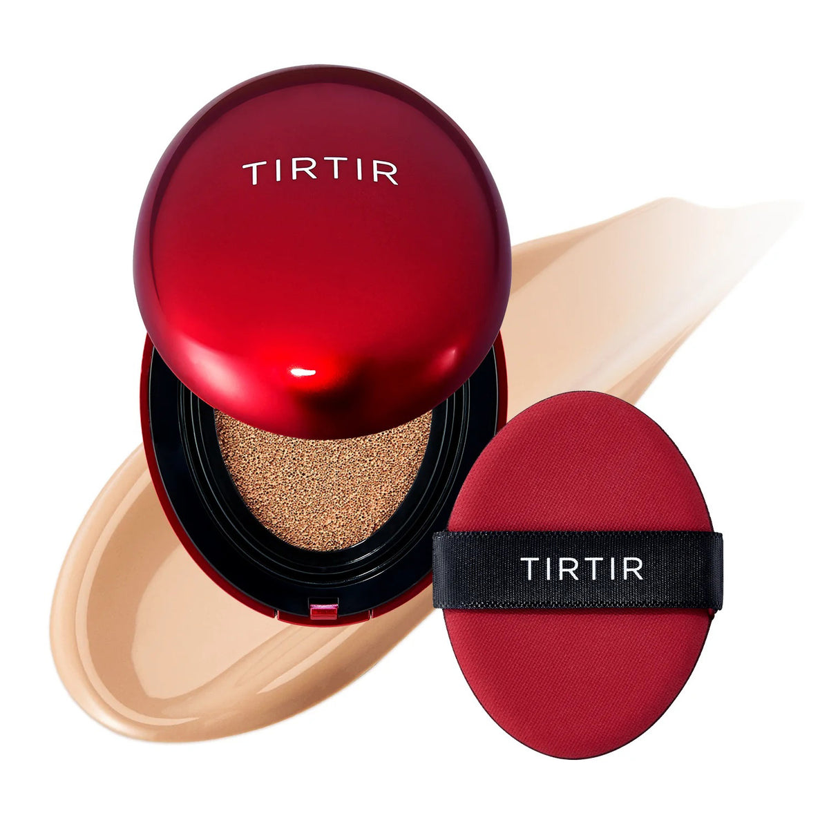 A red compact labeled &quot;TIRTIR - MASK FIT RED CUSHION FOUNDATION IN MOCHA&quot; by KOSMIC KBEAUTY SKINCARE opens to reveal a matching puff with a black TIRTIR band, set against a beige swipe that highlights its hydrating, long-lasting coverage.