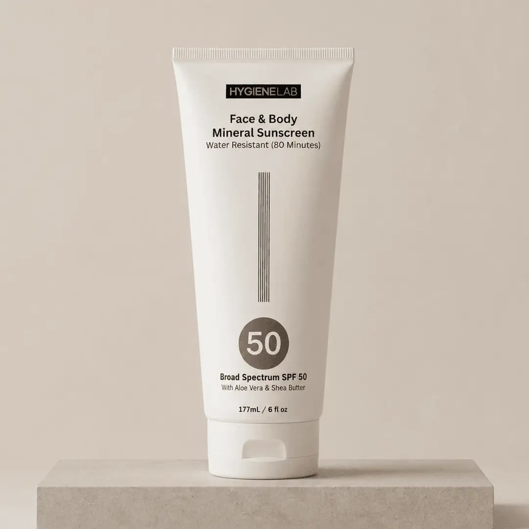 HYGIENELAB - FACE &amp; BODY MINERAL SUNSCREEN, in a white tube, offers broad-spectrum SPF 50 sun protection with 80 minutes of water resistance. Enhanced with soothing aloe vera and nourishing shea butter, this zinc oxide sunscreen comes in a generous 177 mL (6 fl oz) size.