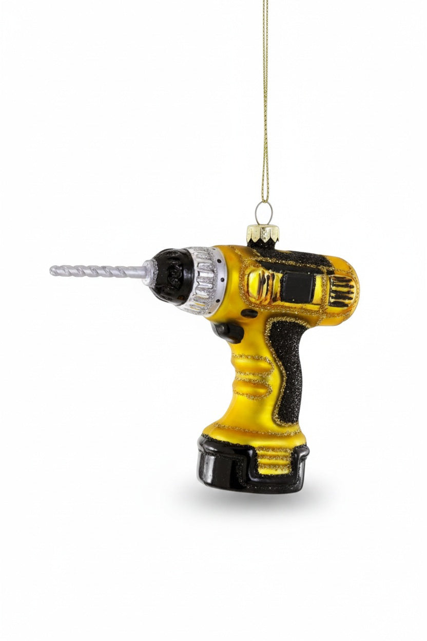 Cody Foster GLASS CORDLESS DRILL ORNAMENT, a 4.5-inch glass holiday ornament shaped like a yellow and black cordless power drill.
