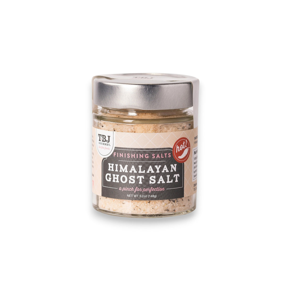 TBJ GOURMET -HIMALAYAN GHOST SALT comes in a clear jar with a metal lid, labeled "Finishing Salts" by TBJ Gourmet, and promises "a pinch for perfection." The 3-ounce (85g) blend offers a distinctive pinkish-white hue.