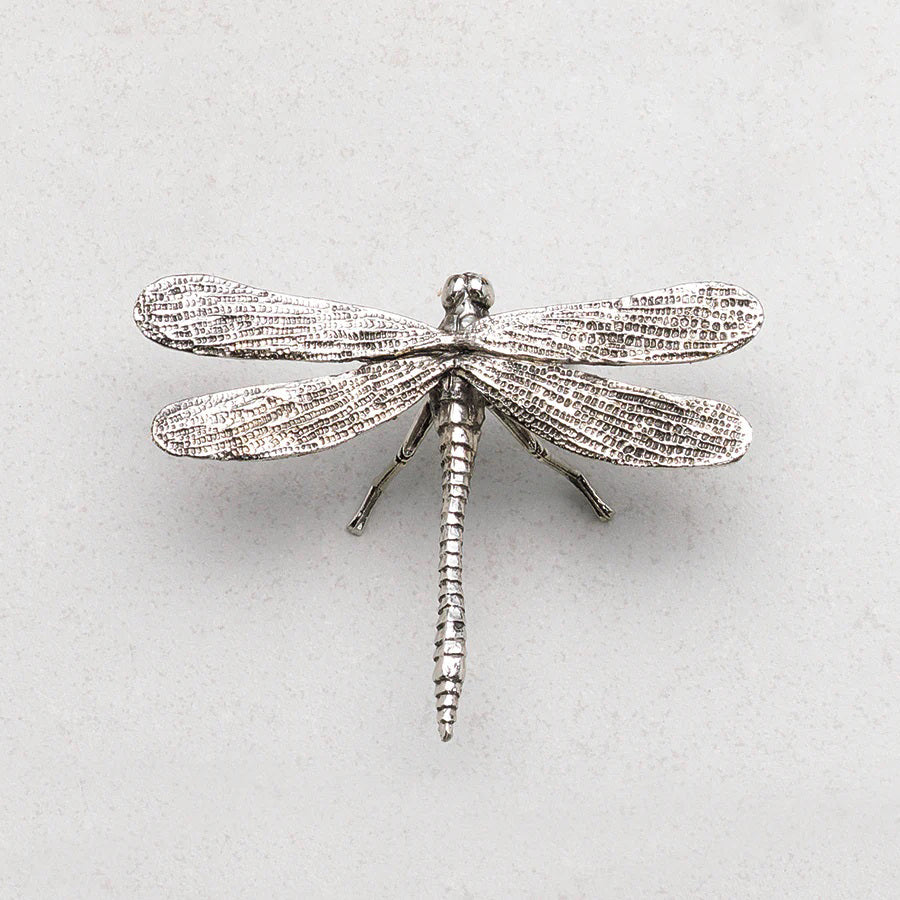 The ZODAX ANTIQUE PEWTER DRAGONFLY features detailed wings and body, shown on a light gray textured background, and fits perfectly in a compact container or small storage box like a 4.75-inch box.