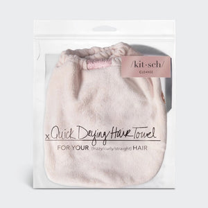 The KITSCH Quick Dry Hair Towel packaging highlights its luxurious eco-friendly blend of organic cotton and bamboo, showcasing softness and high absorbency. An image emphasizes friction-free drying, with the towel elegantly displayed beside the box, reflecting its natural allure.