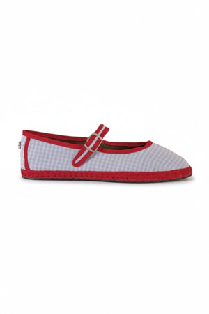 The SVETI STEFAN - MARY JANE SHOE by SVETI STEFAN is a light blue cotton flat with a textured surface, red trim, gel insole, and silver buckle strap, shown against a plain light background.