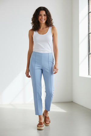 The MAC - ANNA PULL ON PANT by MAC features high-waisted, straight-leg pink trousers made from easy-care fabric, with front creases and small hem slits, shown on a white background.