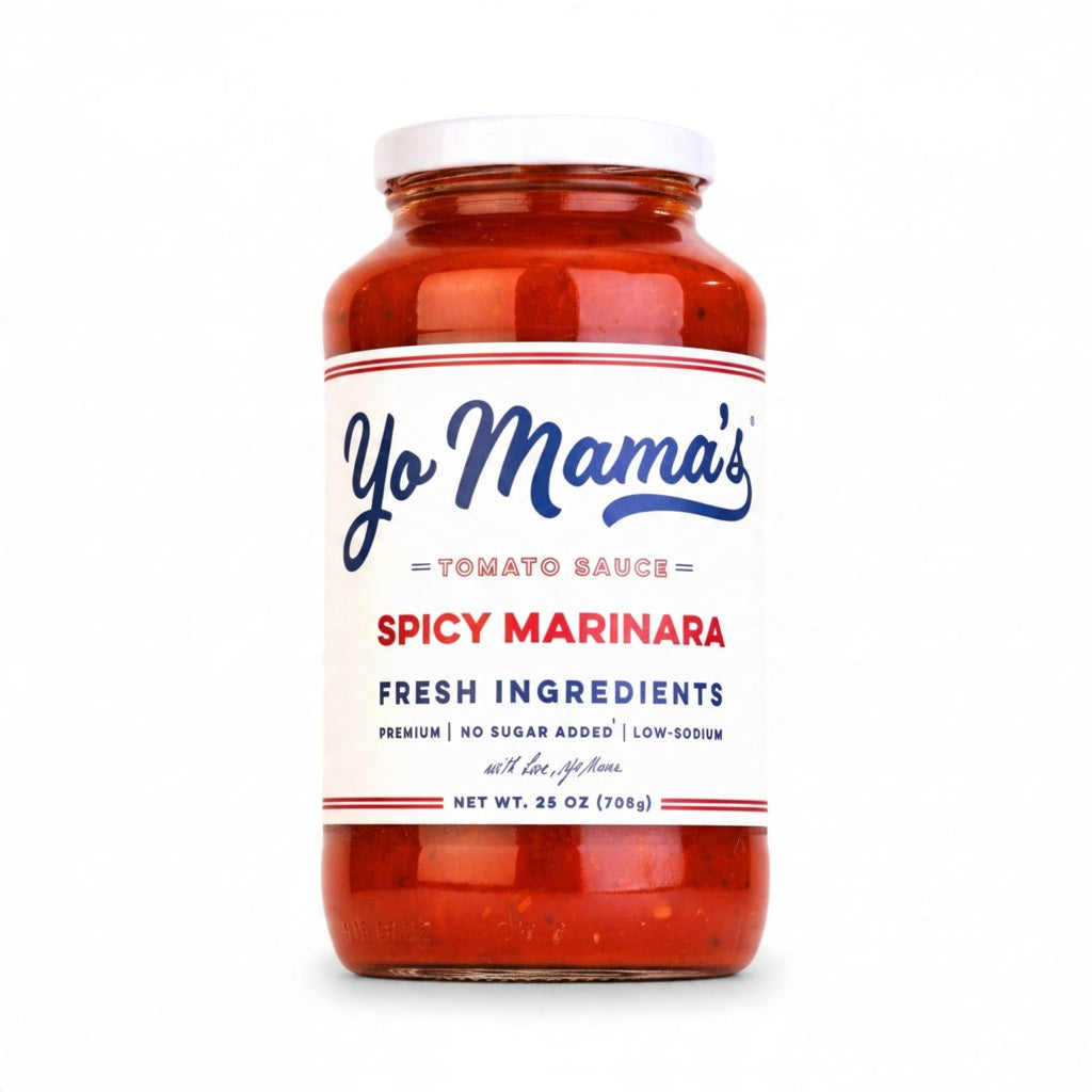 A glass jar of YO MAMA’S - SPICY MARINARA SAUCE with a keto-certified white label, red decorative stripes, and a white lid.