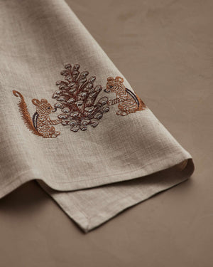 CHIPMUNKS WITH PINECONE LINEN TEA TOWEL by CORAL & TUSK featuring embroidered chipmunks holding a large, stitched pinecone.