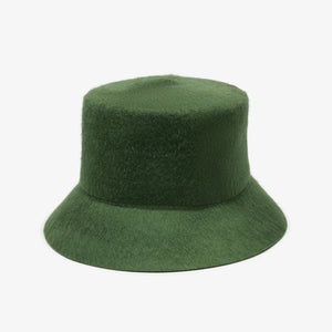 WYETH's TENLEY BUCKET HAT, a blue bucket hat made from fuzzy mohair wool and featuring a wide brim, is presented against a simple white background.