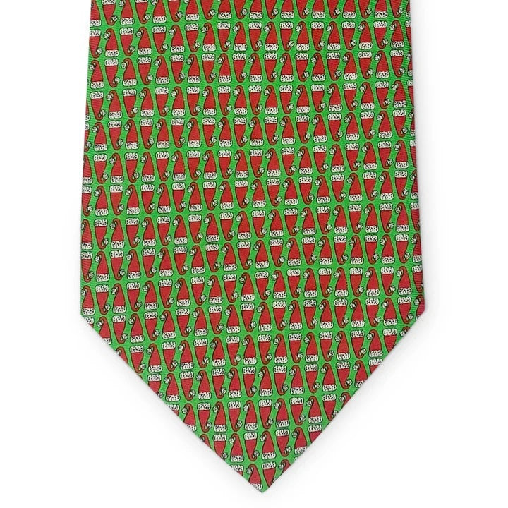 Sure! Here’s a rewritten sentence using your product data: This handmade silk tie by Bird Dog Bay, the PETER-BLAIR - Santa Hats Silk Tie in Green, features a festive green background with a playful Santa hat pattern and classic navy tipping. Crafted in New York for exceptional quality.