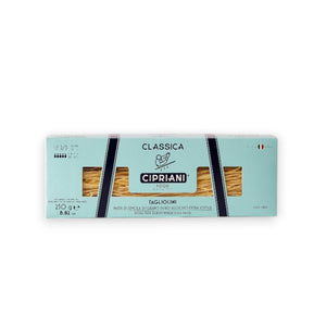A rectangular light blue box labeled "Atalanta Corporation" containing Cipriani - Organic Tagliolini Egg Pasta made from premium durum wheat semolina is centered on a white background. The packaging features the brand name, weight (250g/8.82 oz), a small Italian flag, and the pasta is visible through a window in the packaging.