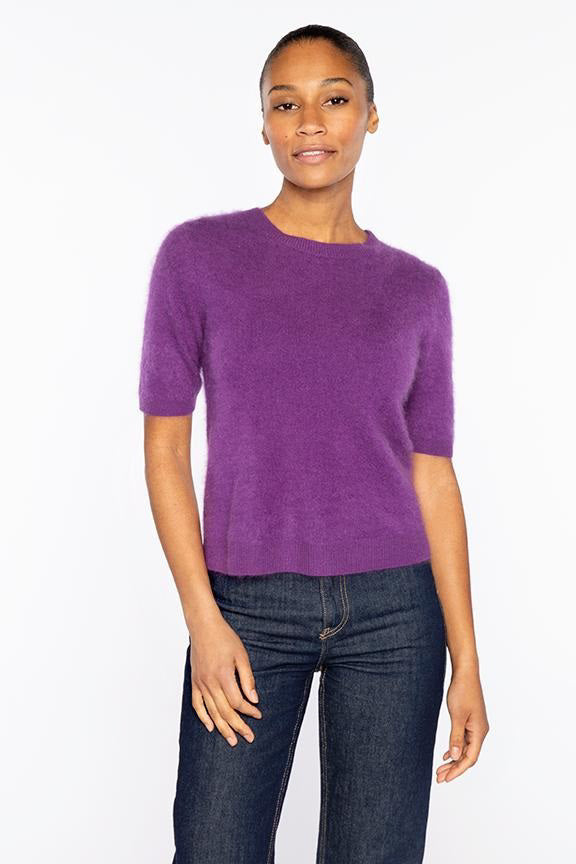The KINROSS CASHMERE Brushed Cashmere Short Sleeve Crew Neck Sweater is a black, 100% cashmere top with a classic crew neckline, shown on a plain white background.
