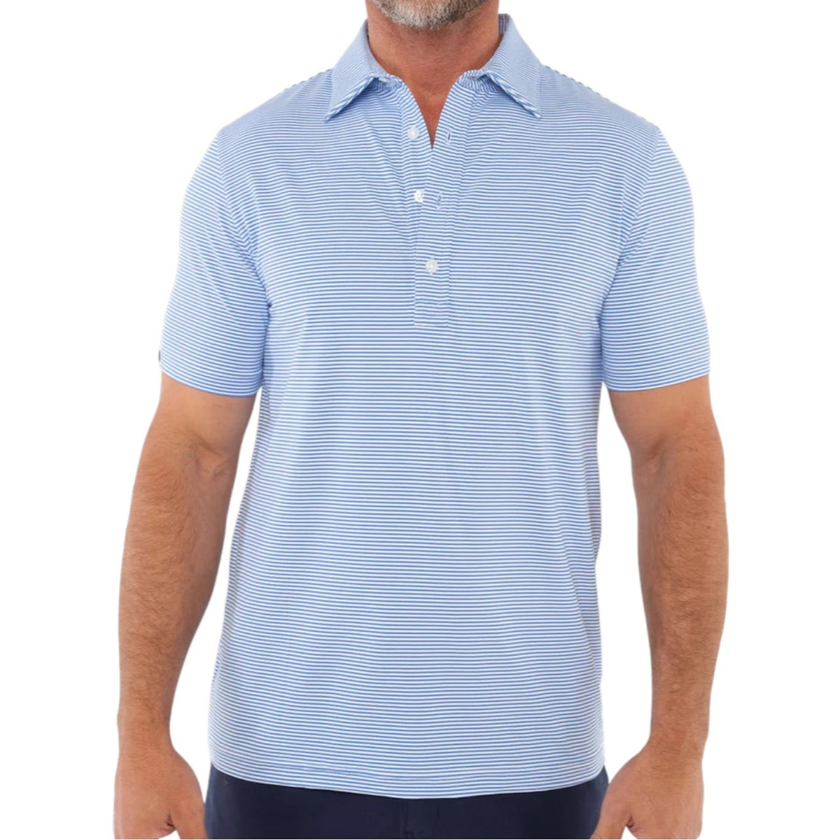 A man wears the CRIQUET Performance Sport Range Polo in Hobby Stripe - Bluebonnet, featuring light blue and white stripes, a collared neckline with three buttons, and lightweight, breathable fabric, standing against a plain white background.