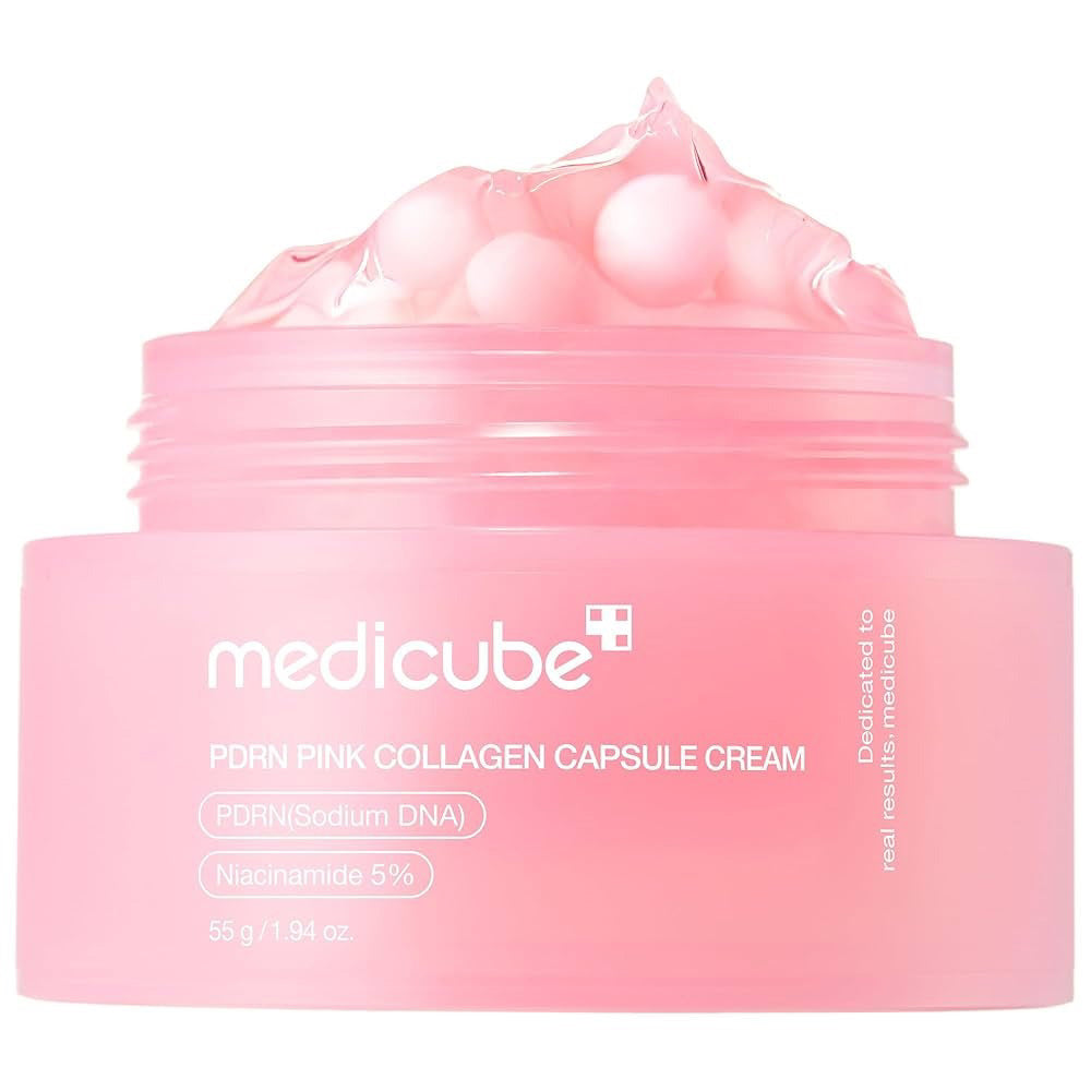 A 55g pink jar of GLOWISS MEDICUBE - SALMON DNA PDRN PINK COLLAGEN CAPSULE CREAM features hydrating round capsules with Salmon DNA PDRN and 5% niacinamide to help improve uneven skin tone.