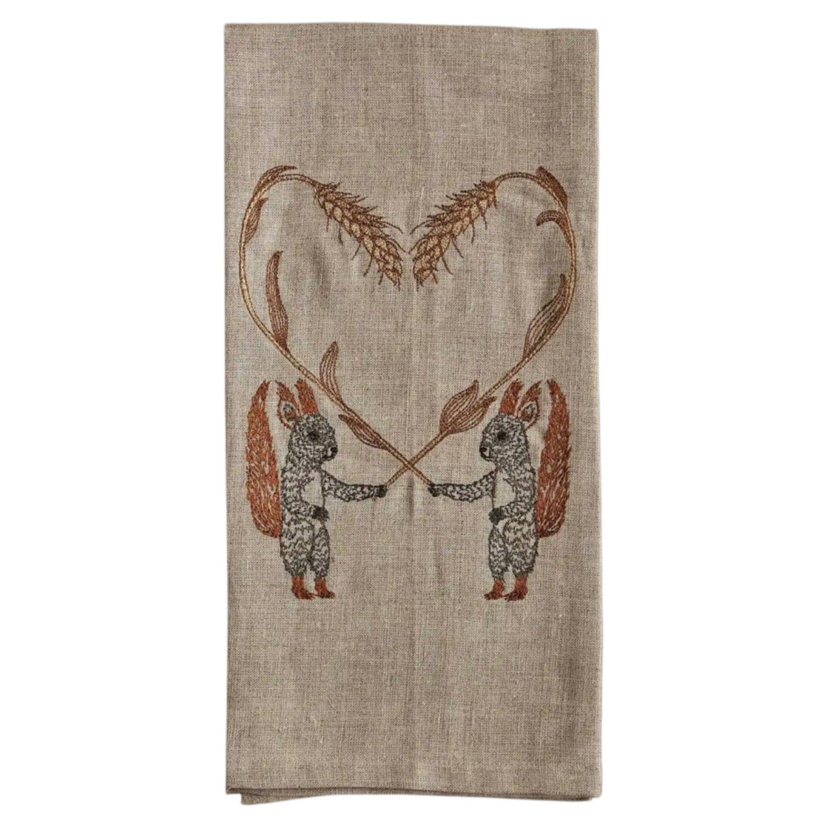 SQUIRRELS WITH WHEAT HEART LINEN TEA TOWEL by CORAL & TUSK featuring two embroidered squirrels holding stalks of wheat that form a heart shape above them.