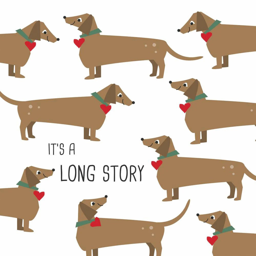 PAPER PRODUCTS DESIGN - LONG STORY BEVERAGE NAPKINS feature dachshunds with green collars and red heart tags on a white background, with the phrase &quot;It&#39;s a long story&quot; among the dogs. Made by PAPER PRODUCTS DESIGN.