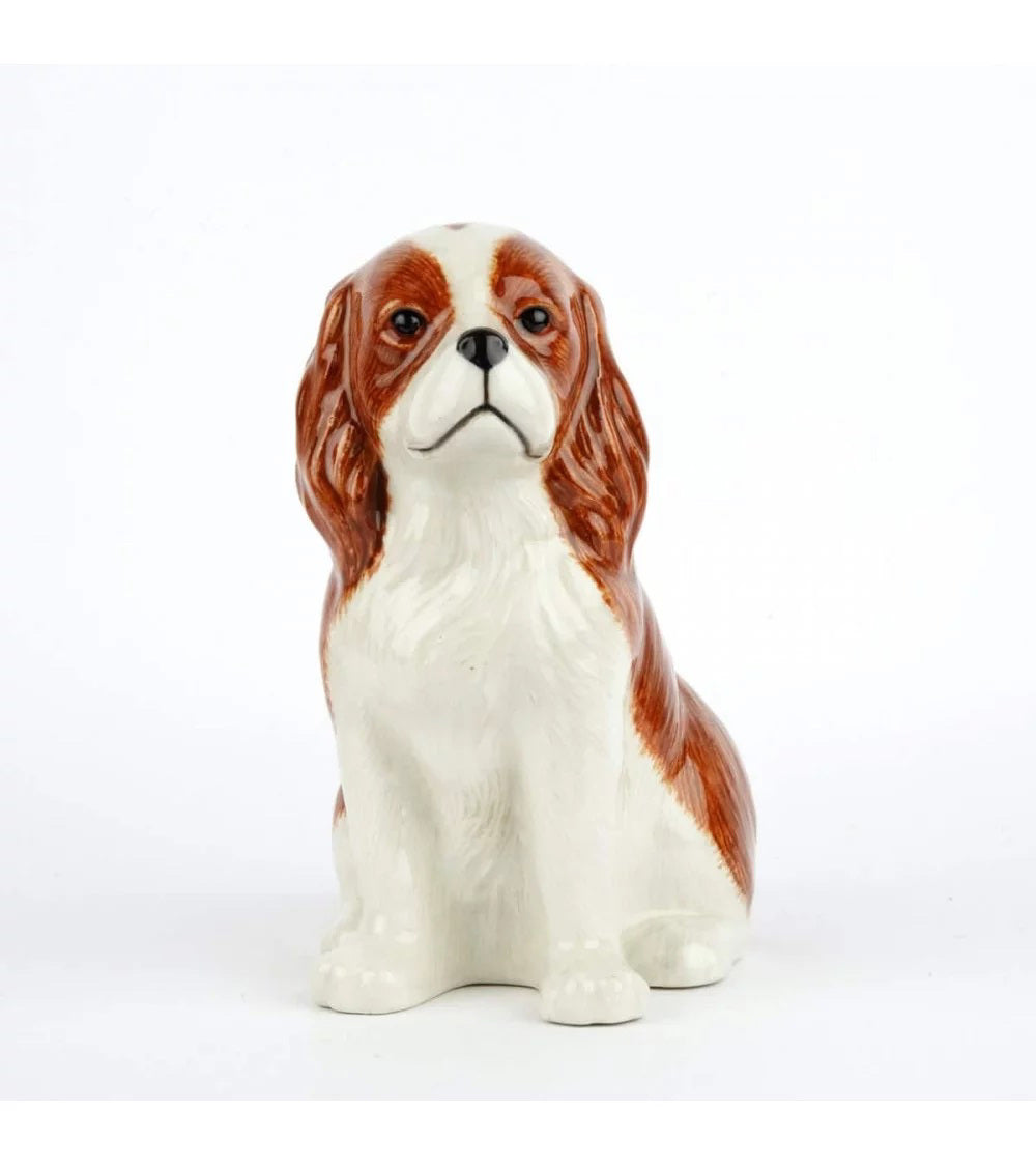 The QUAIL CERAMICS Cavalier King Charles Spaniel Flower Vase by QUAIL DESIGNS, a hand-painted ceramic piece in brown and white, holds yellow tulips and green foliage against a plain white background.