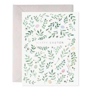 The E. FRANCES PAPER Easter Egg Hunt Greeting Card features "Happy Easter" in a handcrafted watercolor design with green leaves, pastel eggs, and a bunny illustration on a gray envelope. Made in the USA with care by E. FRANCES PAPER.