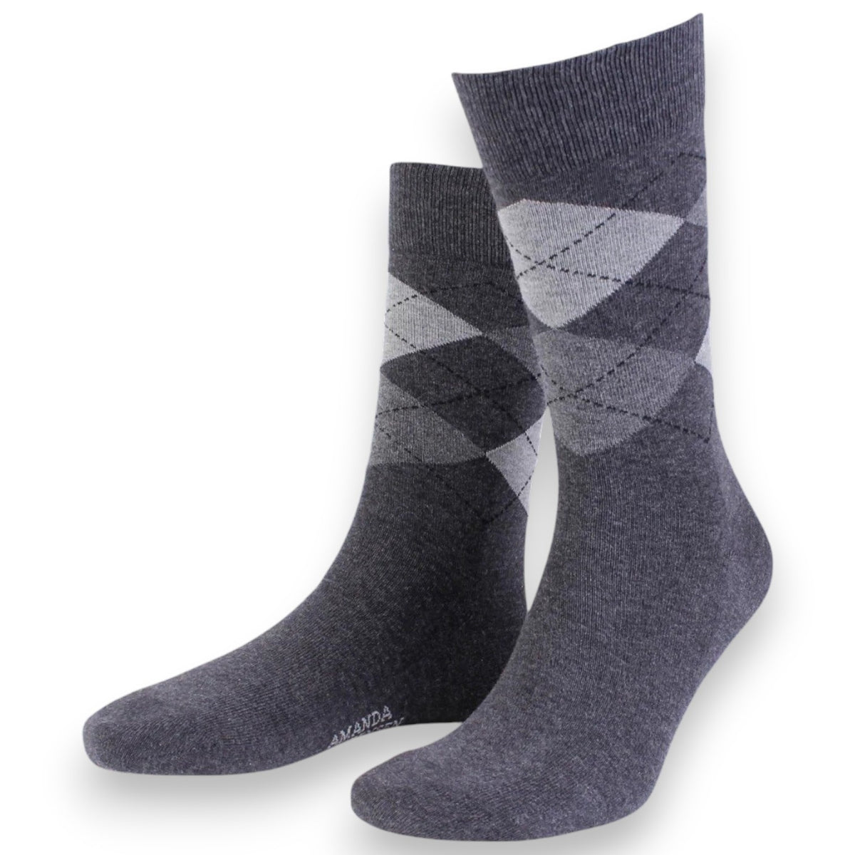 A pair of AMANDA CHRISTENSEN - TRUE ARGYLE MID-CALF SOCKS IN ANTHRACITE MELANGE, Italian-made and featuring a classic diamond argyle pattern in light and dark gray tones, is displayed upright on a white background.