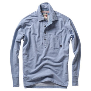 The RELWEN - MARINER POLO IN LIGHT BLUE is a relaxed fit, long-sleeve polo featuring a collar, four-button placket, and front chest pocket. Inspired by the classic French terry polo, this comfortable shirt is displayed laid flat on a white background.