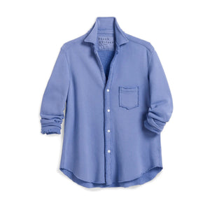 The FRANK & EILEEN Eileen Relaxed Button Up Shirt in Triple Fleece Frost is a light blue, long-sleeve, relaxed fit shirt with a single chest pocket and rolled cuffs, shown on a white background. Garment-dyed for a casual look.