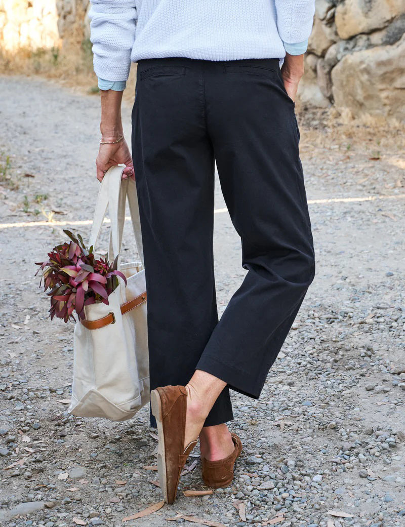 A pair of dark gray, wide-leg chinos from FRANK &amp; EILEEN&#39;s Westport collection, made with performance twill. They feature belt loops and a front button closure, designed for a mid-rise fit. Inside the waistband is a &quot;FRANK &amp; EILEEN&quot; label.