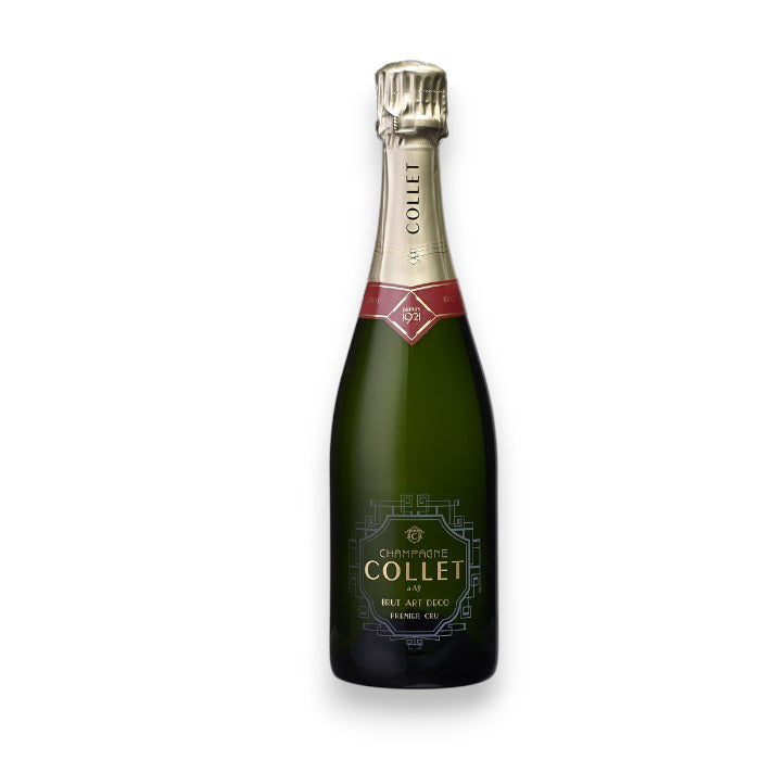 The COLLET 'ART DECO' 1ER CRU BRUT CHAMPAGNE NV from WINE: FREEDOM BEVERAGE features a lemon yellow bottle with gold foil on the neck, a red band with an emblem, and a main label adorned with silver and gold geometric Art Deco designs on a dark green bottle.