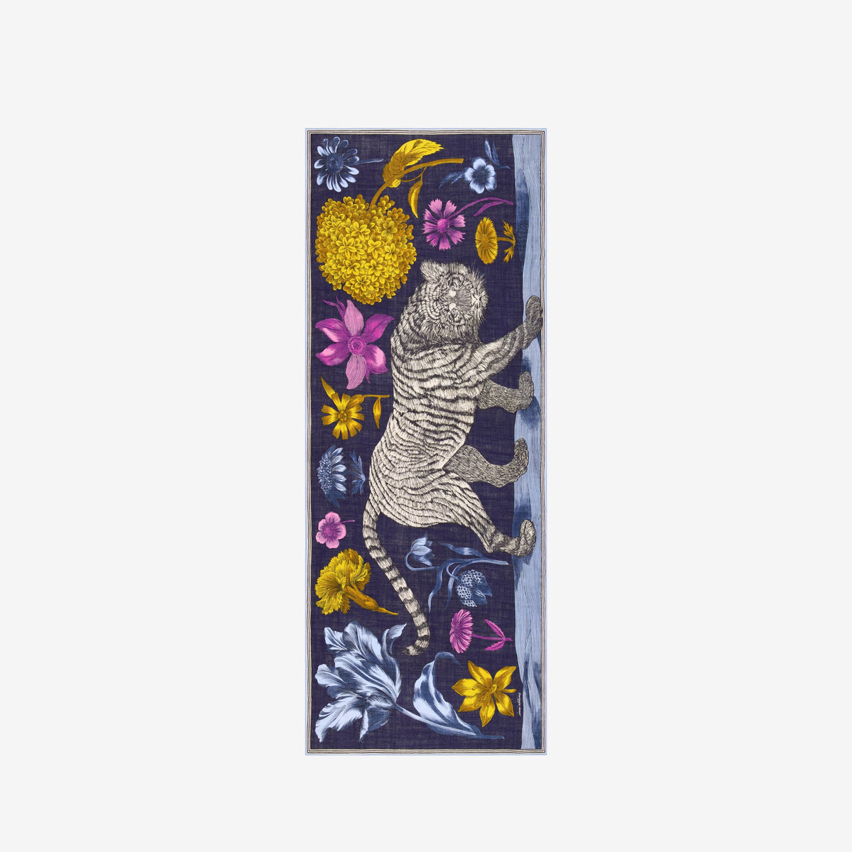 A person stands facing forward against a plain white background, wearing a long dark coat, wide pants, black shoes, and the INOUI EDITIONS - GUSTAV Wool Scarf in Navy by INOUI. An elegant wool rug made in India (80 x 190 cm) is laid beneath their feet.
