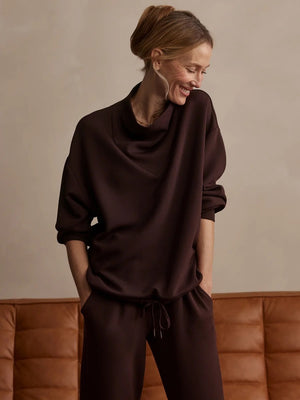 VARLEY - BETSY SWEATSHIRT IN COFFEE BEAN in dark brown DoubleSoft fabric, featuring a long-sleeved silhouette with a high cowl neckline and a drawstring hem.