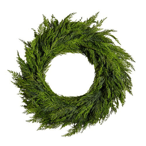 The CEDAR WREATH 28&quot; from RAZ IMPORTS is crafted from lush green foliage and set against a white background.