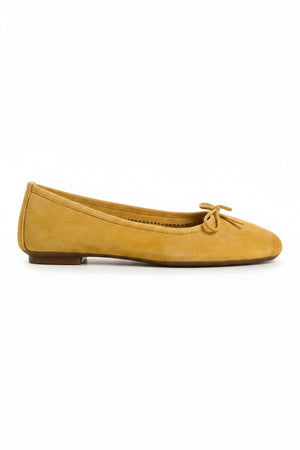REQINS - HARMONY SUEDE BALLERINA FLATS IN OCHRE: a pair of ochre suede ballet flats with a small bow detail at the toes.