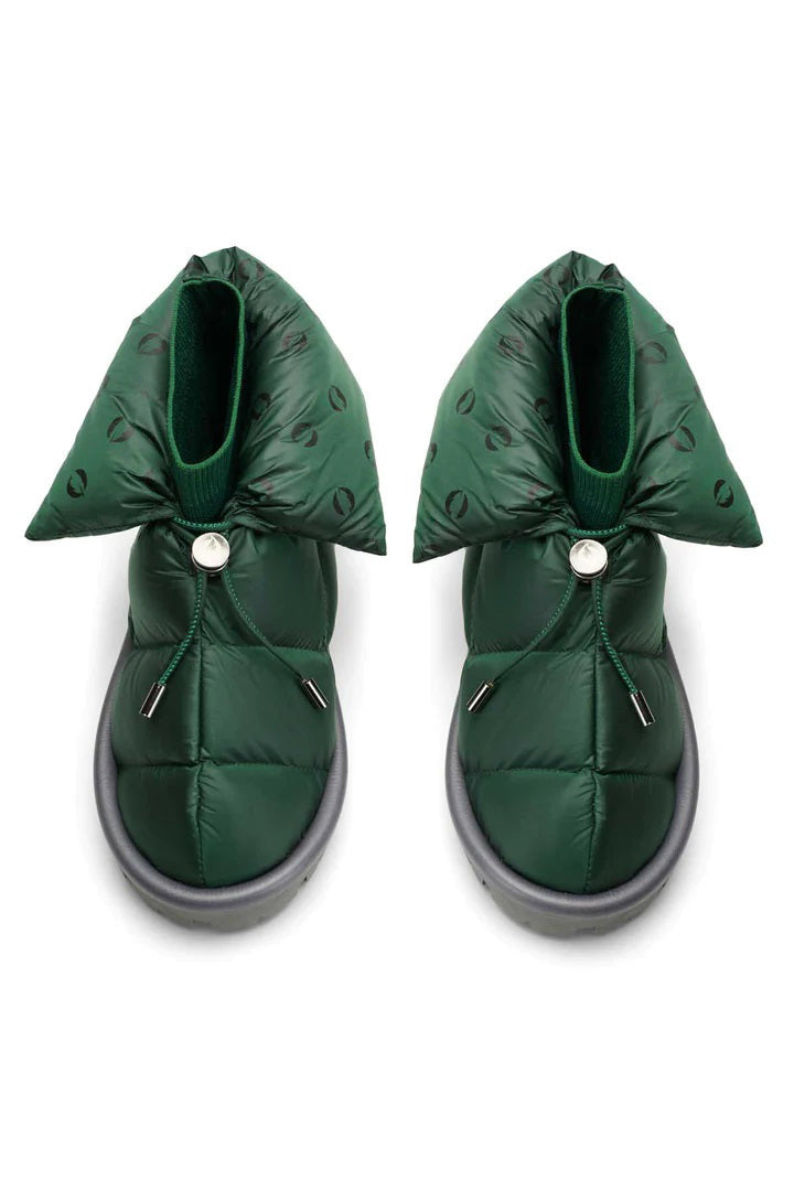 The FLUFIE METALLIC PILLOW BOOT is a pair of gray, insulated slippers with drawstring closures, a high folded collar, water repellent fabric in a subtle circular pattern, designed for warmth and shown on a white background.