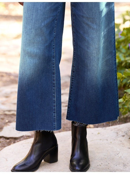 The FRANK &amp; EILEEN Galway Wide Leg Jean in 1999 Wash features a faded ombre effect, cropped raw hem with unfinished edge, classic five-pocket styling, and visible stitching for an effortlessly cool look.