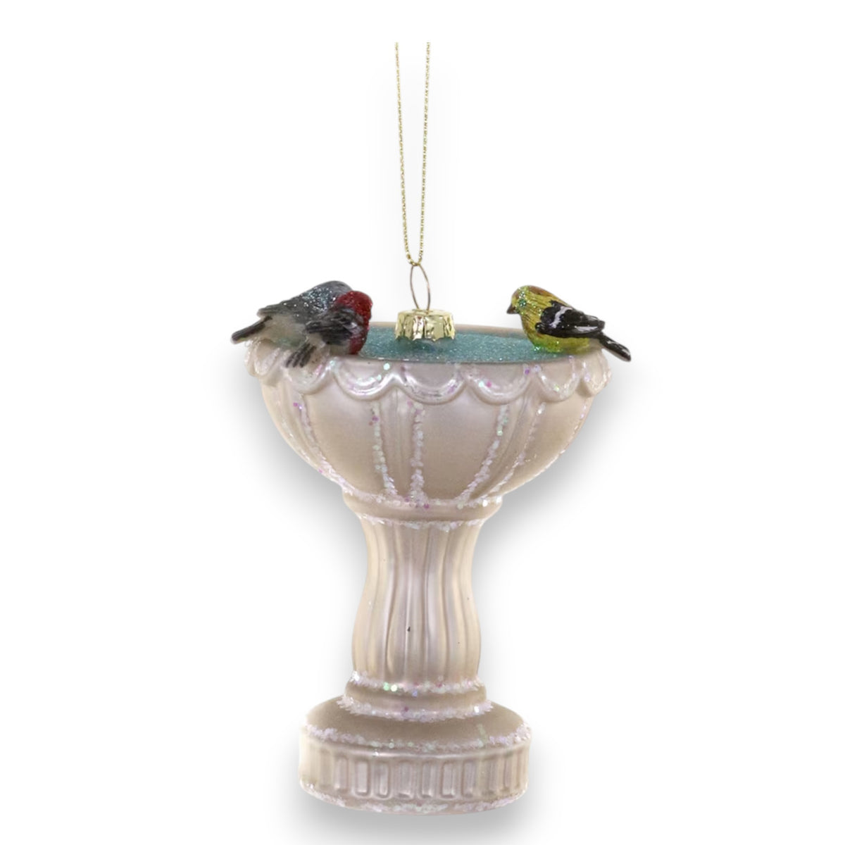 The CODY FOSTER BIRD BATH ORNAMENT features a white bath with two colorful birds perched on the edge, hanging by a gold string—a delightful holiday gift for collectors and design lovers.