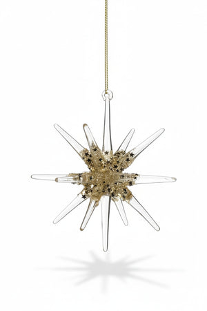 Two 4.75-inch GLASS 3D SNOWFLAKE ORNAMENT SMALL star-shaped glass ornaments with gold glitter accents hanging from a pine branch.