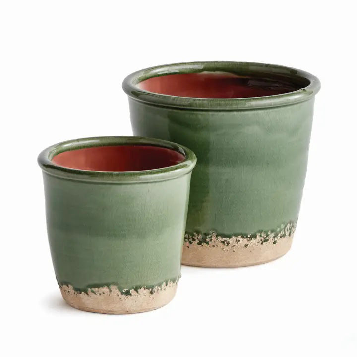 Close-up of the NAPA HOME AND GARDEN - MAISHA POT, featuring a green crackle-glazed top and textured unglazed beige bottom—a beautiful ceramic planter with a seamless natural transition between surfaces.