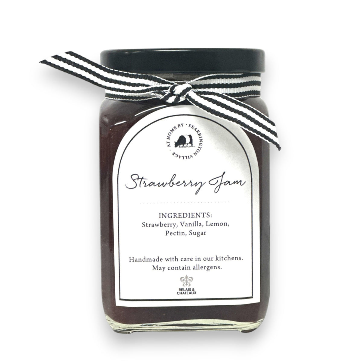 Introducing the FEARRINGTON HOUSEMADE STRAWBERRY JAM from the FEARRINGTON SIGNATURE COLLECTION, this jar of delicious strawberry jam is adorned with a charming black and white striped ribbon tied around the lid. Perfect as a hostess gift, its label lists wholesome ingredients such as strawberry, vanilla, lemon, pectin, and sugar. This handmade treat may contain allergens and is a delightful choice for breakfast jam enthusiasts.