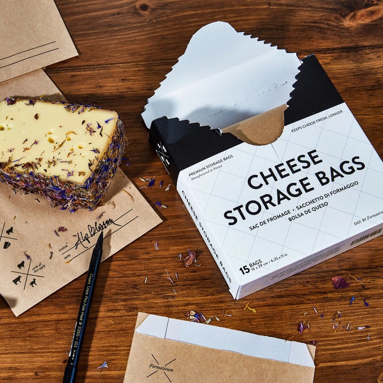 A white box labeled "FORMATICUM - CHEESE STORAGE BAGS" with cow, goat, and sheep icons. Includes 15 bags (6.25 x 11 in) for cheese storage at home; info available in multiple languages.