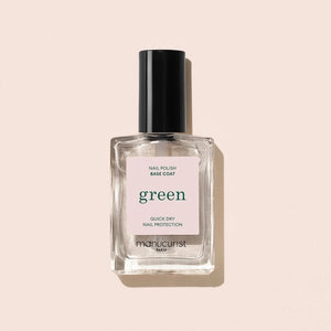 A clear glass bottle of MANUCURIST - GREEN™ BASE COAT by MANUCURIST INC, featuring a black cap and a white label with green and black text, part of their vegan nail care collection.
