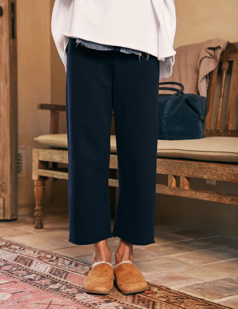 The image showcases the FRANK &amp; EILEEN - CATHERINE Favorite Sweatpant in British Royal Navy, featuring a fashion-forward wide-leg cropped fit with a drawstring waist. The mid-rise sweatpants are displayed against a plain white background.