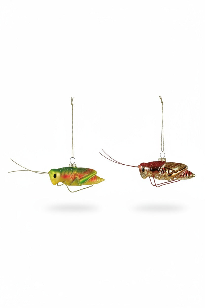 Two hand-painted GRASSHOPPER ORNAMENTs in assorted styles, one in green and yellow and one in metallic brown.