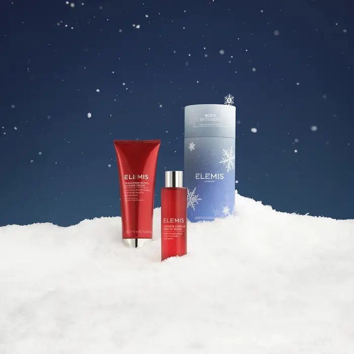 The ELEMIS - BODI WONDERS DUO SET by ELEMIS - STEINER includes a shower cream and Frangipani Monoi Body Oil in sleek red packaging, perfect for elevating your bodycare routine.